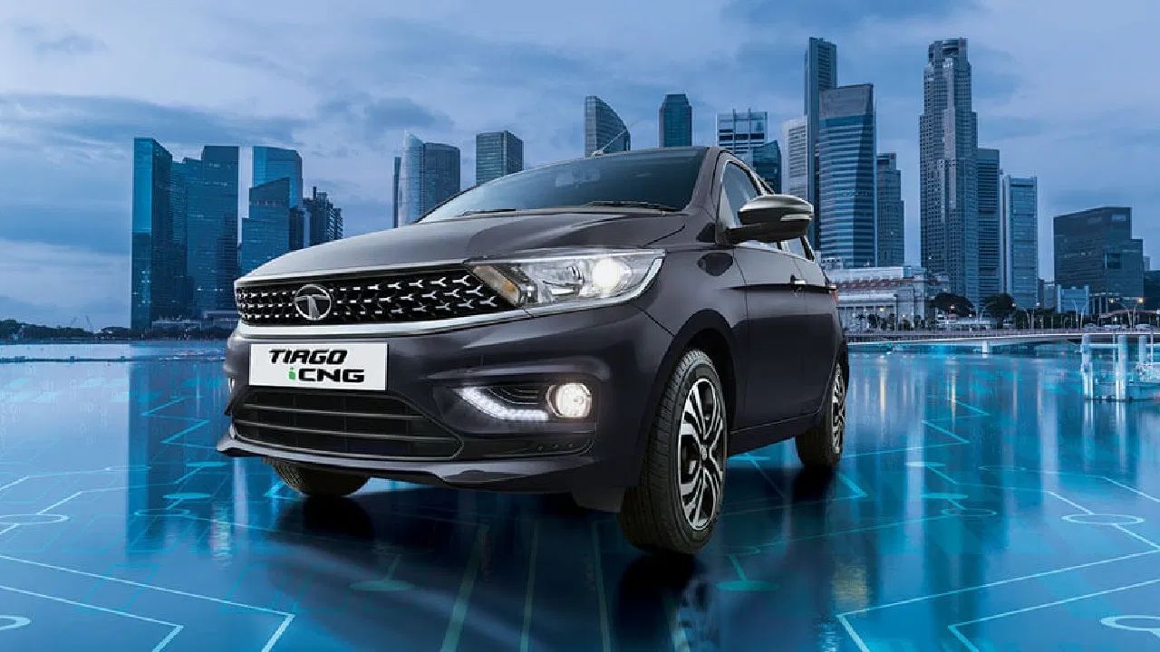 Tata Tiago iCNG: টাটা মটৰ্ছৰ চিএনজি বাহনত iCNG প্ৰযুক্তি উপলব্ধ। টাটাৰ এই বাহনখনৰ এক্স শ্ব’ৰুম মূল্য ৮.২৯ লাখ টকাৰ পৰা আৰম্ভণি হয়। এই গাড়ীখনে আপোনাক প্ৰতি কিলোগ্ৰাম চিএনজিত ২৬.৪৭ কিলোমিটাৰ পৰ্যন্ত মাইলেজ দিব পাৰে।