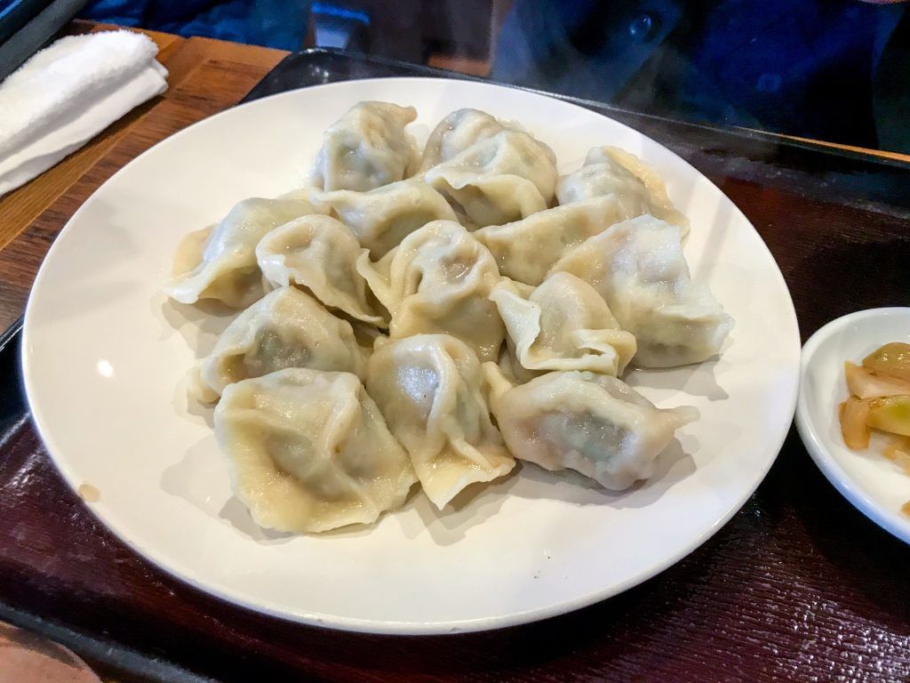 Freshly Boiled Jiaozi Served On Table