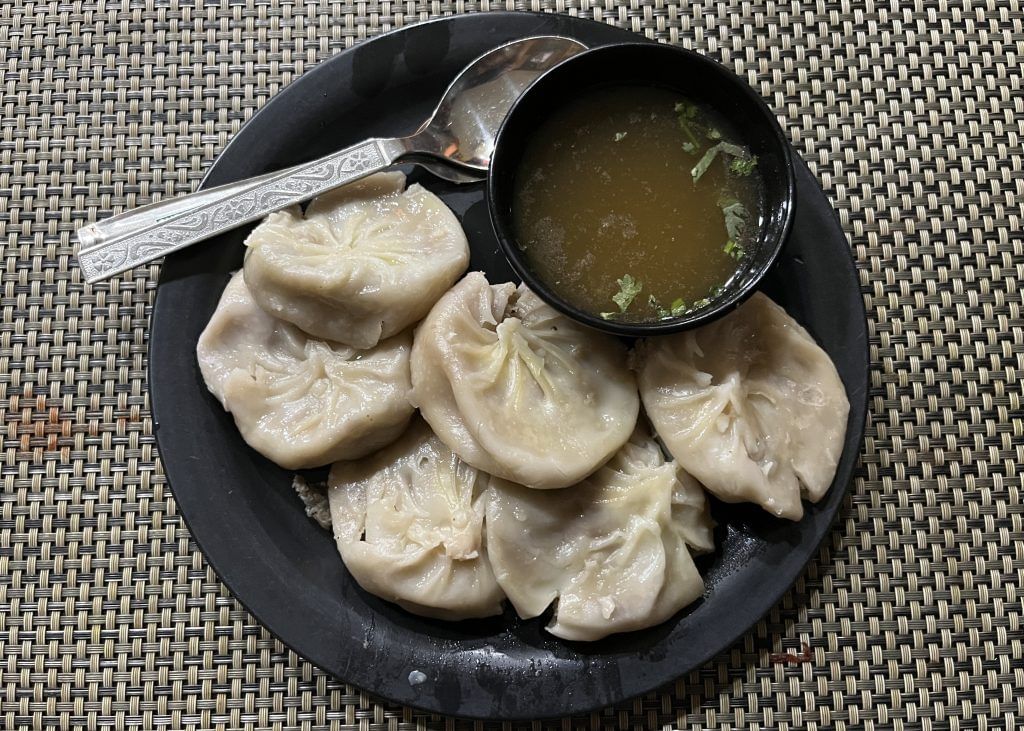 Plate Full Of Momo With Soup