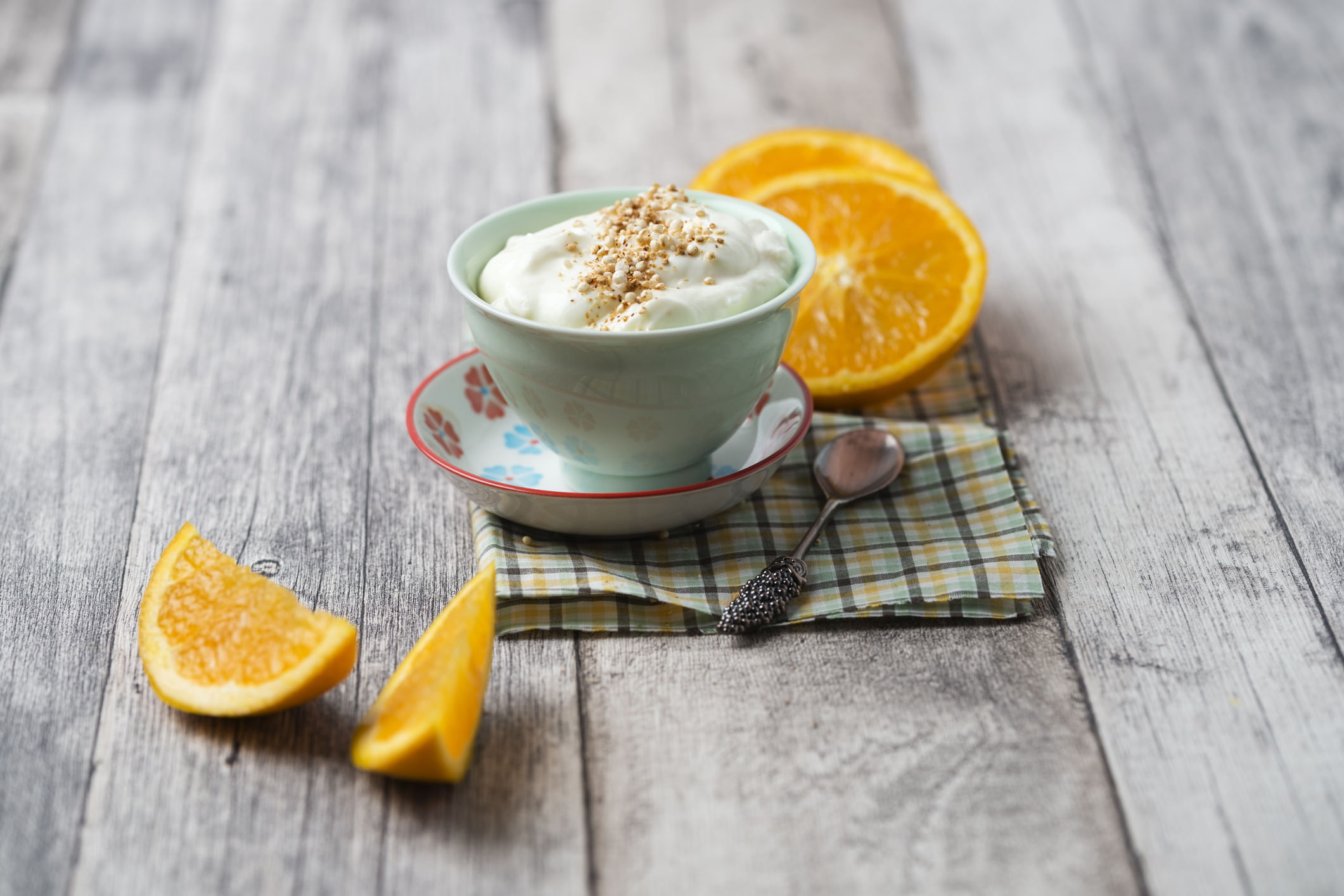 Bowl Of Orange Curd Creme With Popped Quinoa